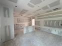 Unfinished living room showcases an open-concept design; ready for customization and personal design at 1006 Starmoss Lane, Conyers, GA 30094