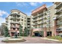 Elegant building exterior with multiple balconies and manicured landscaping, creating a luxurious appeal at 200 River Vista Dr # 436, Atlanta, GA 30339