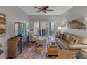 Comfortable living room with hardwood floors and balcony access, perfect for relaxing or entertaining guests at 200 River Vista Dr # 436, Atlanta, GA 30339