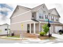 Charming two-story townhome with a well-maintained lawn and appealing curb appeal at 532 Walton Dr, Woodstock, GA 30188