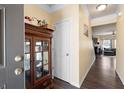 Welcoming foyer with hardwood floors and a view into the living area at 406 Crescent Woode Dr, Dallas, GA 30157