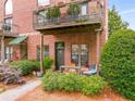 Attractive brick building with a cozy outdoor seating area and pretty shrubs at 791 Wylie Se St # 709, Atlanta, GA 30316