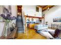 Inviting living room with high ceilings, stairs, and an open floor plan with a modern aesthetic at 1661 La France Ne St # 221, Atlanta, GA 30307