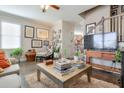 Comfortable living room with hardwood floors, stylish decor, and ample natural light at 660 Delbridge Nw St, Atlanta, GA 30314