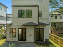 Rear exterior of the home showcasing double doors and a fenced-in yard at 88 Cleveland Unit B Se St, Atlanta, GA 30316