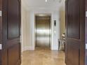 Elegant foyer area with elevator featuring a modern design at 88 W Paces Ferry # 2230, Atlanta, GA 30305