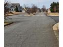 A quiet residential street featuring well-maintained roads and sidewalks, providing a peaceful neighborhood setting at 28 Samuel Nw Way, Cartersville, GA 30121