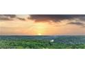 Panoramic view of lush green forest and river at sunset at 3300 Windy Ridge Se Pkwy # 1401, Atlanta, GA 30339