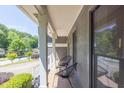 Charming front porch with cozy seating, offering a peaceful retreat with neighborhood views at 2991 Windfield Cir, Tucker, GA 30084