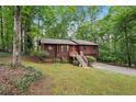 Charming split level home with a wooded lot at 3679 Regent Nw Dr, Kennesaw, GA 30144