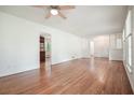 Spacious living room with hardwood floors and views to the kitchen at 2350 Maxine Se Dr, Marietta, GA 30067