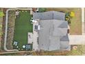 Birds-eye view of the home's backyard featuring a patio, lush turf, and manicured landscaping at 2798 Glenlocke Nw Cir, Atlanta, GA 30318