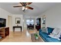 Cozy living room leading to a dining area, featuring hardwood floors, and ample natural light at 3081 Anthony Dr, Decatur, GA 30033