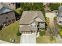 Stunning home showcasing its spacious lot, manicured landscaping, and a desirable neighborhood setting at 2906 Ansley Manor Ct, Marietta, GA 30062