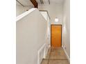 Hallway and entrance to a room with a wood door at 350 Peters Sw St # 6, Atlanta, GA 30313