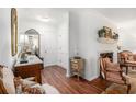 Inviting living room features hardwood floors, fresh paint, and a decorative fireplace at 170 Elysian Nw Way, Atlanta, GA 30327
