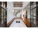 Open foyer showcasing high ceilings, hardwood floors, and a staircase leading to the upper level at 310 Anders Path, Marietta, GA 30064