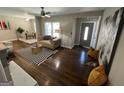 Inviting living room featuring hardwood floors, stylish furnishings, and ample natural light at 1740 Emerald Ave Ave, Atlanta, GA 30310
