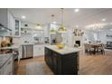 Well-appointed kitchen with stainless steel appliances, granite countertops, and an island with seating at 3226 Custer Lake Nw Dr, Marietta, GA 30064