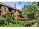 Beautiful apartment complex with lush landscaping, well-manicured lawns, and a classic architectural style at 677 Somerset Ne Ter # C6, Atlanta, GA 30306