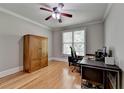 Functional home office with hardwood floors, natural light, and ample workspace at 1875 Briergate Dr, Duluth, GA 30097