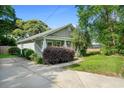 This charming house features a well-maintained lawn and a side driveway perfect for easy access at 1283 Mercer Ave, East Point, GA 30344