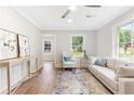 Bright living room with wood floors, lots of natural light, and modern furnishings at 2260 Old Spring Se Rd, Smyrna, GA 30080