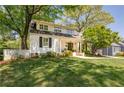 Charming two-story home with a well-manicured front yard and inviting curb appeal at 26 Kensington Rd, Avondale Estates, GA 30002