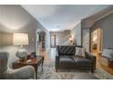 Comfortable living room featuring hardwood floors, soft gray walls, and stylish furnishings at 26 Kensington Rd, Avondale Estates, GA 30002