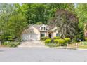 Attractive single-Gathering home with two-car garage and well-maintained yard at 2825 Harbor Cove Ct, Cumming, GA 30041