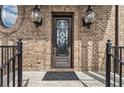 Stunning front door with decorative glass and elegant lighting create a welcoming entrance to the home at 629 Boulevard Ne, Atlanta, GA 30308