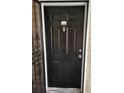 Black door with a gold colored knocker, and the unit number is 1103 at 1103 Waldrop Pl, Decatur, GA 30034