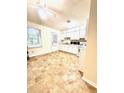 Functional kitchen featuring classic cabinetry and durable tile floors, offering a practical design at 135 E Hill St # 12, Decatur, GA 30030