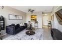Inviting living room with a modern sofa, breakfast bar, and stylish decor at 1280 W Peachtree Nw St # 810, Atlanta, GA 30309
