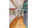 Spacious foyer showcasing hardwood floors and an open view to the living area at 1815 Montcliff Dr, Cumming, GA 30041