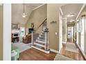 View of an entryway and a living room space featuring a fire place and connecting hallways at 3125 Flatbottom Dr, Dacula, GA 30019