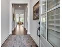 Inviting foyer featuring hardwood floors and an artful rug at 208 Idylwilde Way, Canton, GA 30115