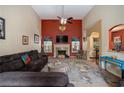Cozy living room features a fireplace, high ceilings, and lots of natural light at 25 Skylar Dr, Covington, GA 30016