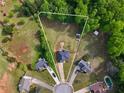 Aerial view showcasing the property's large lot, mature trees and proximity to a cul-de-sac at 1314 Durham Ter, Mcdonough, GA 30252