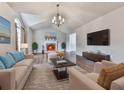 Inviting living room with a fireplace, hardwood floors, and abundant natural light at 3623 Spring Meadow Ct, Acworth, GA 30101