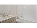 Bright, newly renovated bathroom with a shower-tub combination and a modern vanity at 651 Soul Aly # 135, Alpharetta, GA 30009
