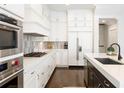 Well-equipped kitchen featuring modern stainless steel appliances and ample counter space at 1085 Celebration Dr, Roswell, GA 30076