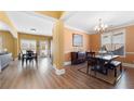 Bright dining room featuring hardwood floors and large windows that offer plenty of natural light at 5015 Scuppernong Ct, Austell, GA 30106