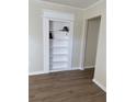 White built in shelving next to a doorway in the room at 3133 Rebecca St, Covington, GA 30014