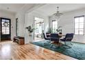 Bright dining room with hardwood floors, stylish chandelier, and elegant decor at 797 Greenwood Ne Ave, Atlanta, GA 30306