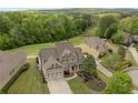 Beautiful home with golf course view, lush greenery and mature trees at 44 Kingsford Xing, Acworth, GA 30101