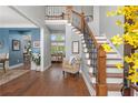 Inviting foyer with hardwood floors and staircase and lots of natural light at 44 Kingsford Xing, Acworth, GA 30101