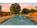 Large backyard swimming pool with a spacious patio area, perfect for outdoor entertaining at 1477 Highway 85 Connector, Brooks, GA 30205