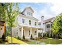 Charming two-story home with a covered front porch and beautifully landscaped yard at 2761 Mathews St, Smyrna, GA 30080