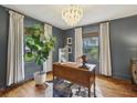 Stylish home office with hardwood floors, neutral walls, and ample natural light at 403 Blake Se Ave, Atlanta, GA 30316